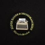 Sammelmünze - Jason Darks Schreibmaschine Olympia Monica - MIT SIGNIERTER KARTE